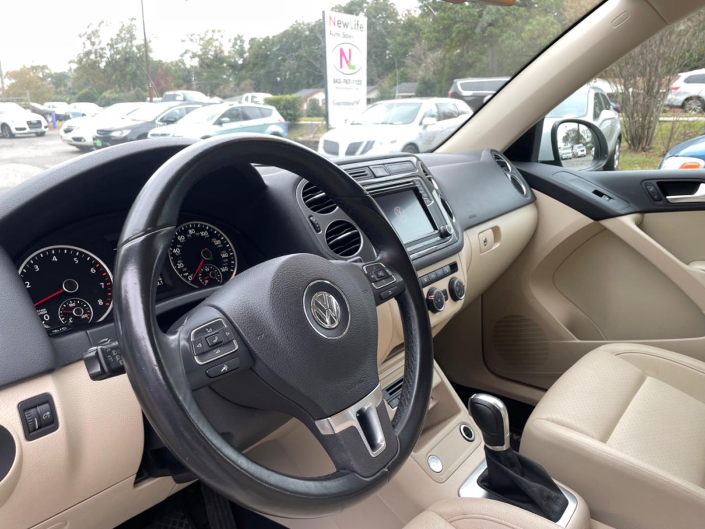 2017 WHITE VOLKSWAGEN TIGUAN S (WVGAV7AX7HK) with an 2.0L engine, Automatic transmission, located at 5103 Dorchester Rd., Charleston, SC, 29418-5607, (843) 767-1122, 36.245171, -115.228050 - Clean Interior with Leather, CD/AUX/USB/Bluetooth, Power Everything (windows, locks, seat, mirrors), Heated Seats, All-weather Mats, Push Button Start, Keyless Entry, Alloy Wheels. Clean CarFax (no accidents reported!) Local Trade-in!! 99k miles Located at New Life Auto Sales! 2023 WINNER for Pos - Photo#19